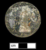 18BC80 - Front and side views of sulphide marble with an owl figurine. There is much damage to the surface of this marble, suggesting it was well-used - click on image to see larger view.
